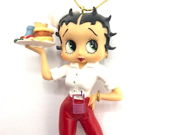Gorgeous collectible Betty Boop  Christmas ornament as we tres son roller skates.