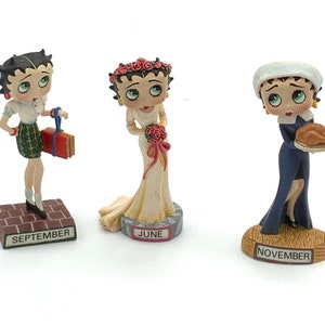 Gorgeous collectible and vintage  Betty Boop, September,  June, November.