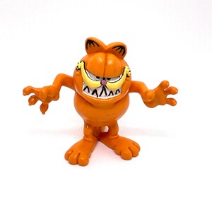 Gorgeous and Vintage Garfield as a monster, figurine, cat, orange., big mouth.