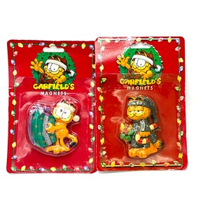 Gorgeous collectible and vintage Garfield magnet refrigerator decoration. Christmas present magnet and Garfield with pj.