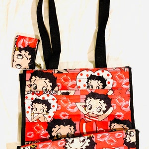 Gorgeous collectible and vintage Betty Boop purse with small wallet, NWT.