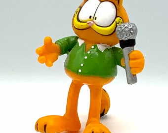 Gorgeous collectible and vintage Garfield as singer cat, orange, toy.