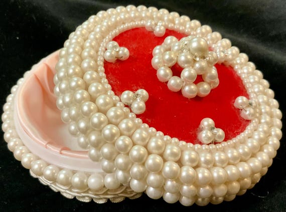 A genuine 1950s pearl-beaded vanity jar — the kind of thing you'd find in your glamorous grandmother's boudoir and immediately want to keep.