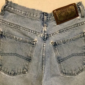 Georgio Armani Blue Jeans/Blue-Denim/High-Rise/Tapered-Leg/Distressed/Ripped/Torn/Woman's (waist 27-28”) Vintage