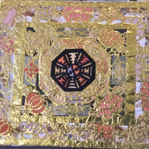 May include: A gold and black octagonal design with intricate details, surrounded by a border of gold and red floral patterns. The design is set against a background of gold and white paper.