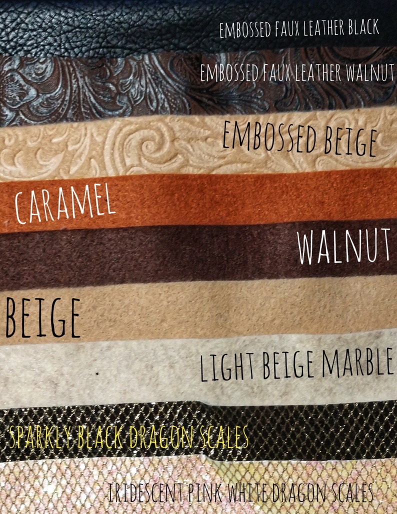 May include: A close-up of ten different fabric swatches. The swatches are arranged vertically from top to bottom. The swatches are labeled with the following names: Embossed Faux Leather Black, Embossed Faux Leather Walnut, Embossed Beige, Caramel, Walnut, Beige, Light Beige Marble, Sparkly Black Dragon Scales, Iridescent Pink White Dragon Scales.