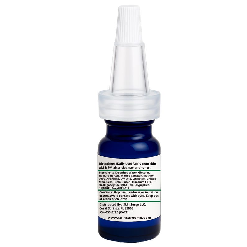 May include: A small cobalt blue glass bottle with a white pointed applicator tip. The label features white text listing directions, ingredients including Hyaluronic Acid and Marine Collagen, cautions, and contact information for Skin Surge LLC.