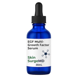 May include: A cobalt blue glass dropper bottle containing 30mL of EGF Multi-Growth Factor Serum by Skin SurgeMD. The bottle features a black dropper cap and a white label with black and green text, including a small dark blue molecular icon.
