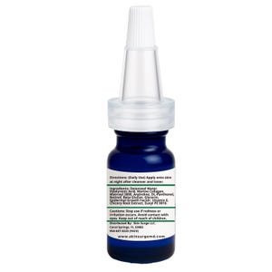 May include: A dark blue skincare serum bottle with a white dropper and label. The label includes product information and ingredients. The bottle is designed for nighttime use after cleansing and toning.