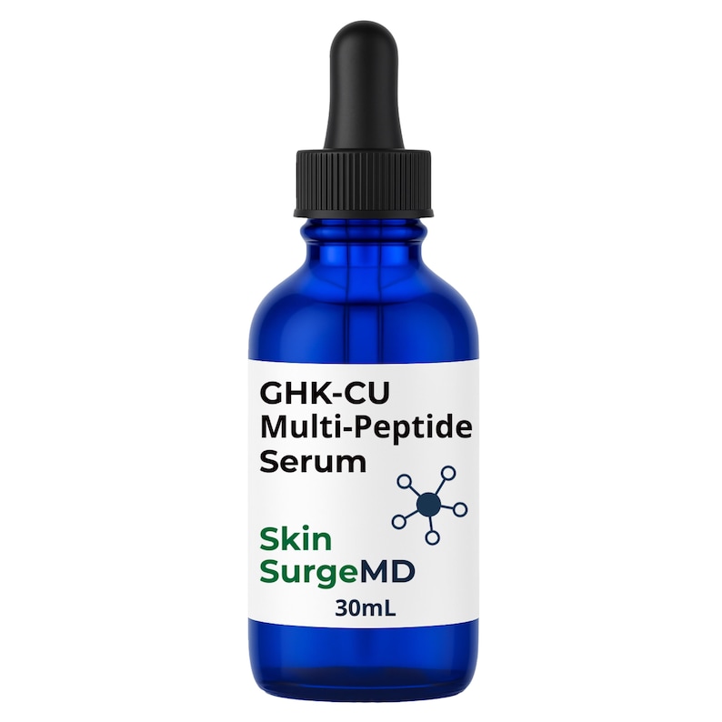 May include: A cobalt blue serum bottle with a black dropper. The label reads "GHK-CU Multi-Peptide Serum" and "Skin SurgeMD" with a 30mL volume. A molecular diagram is also on the label.