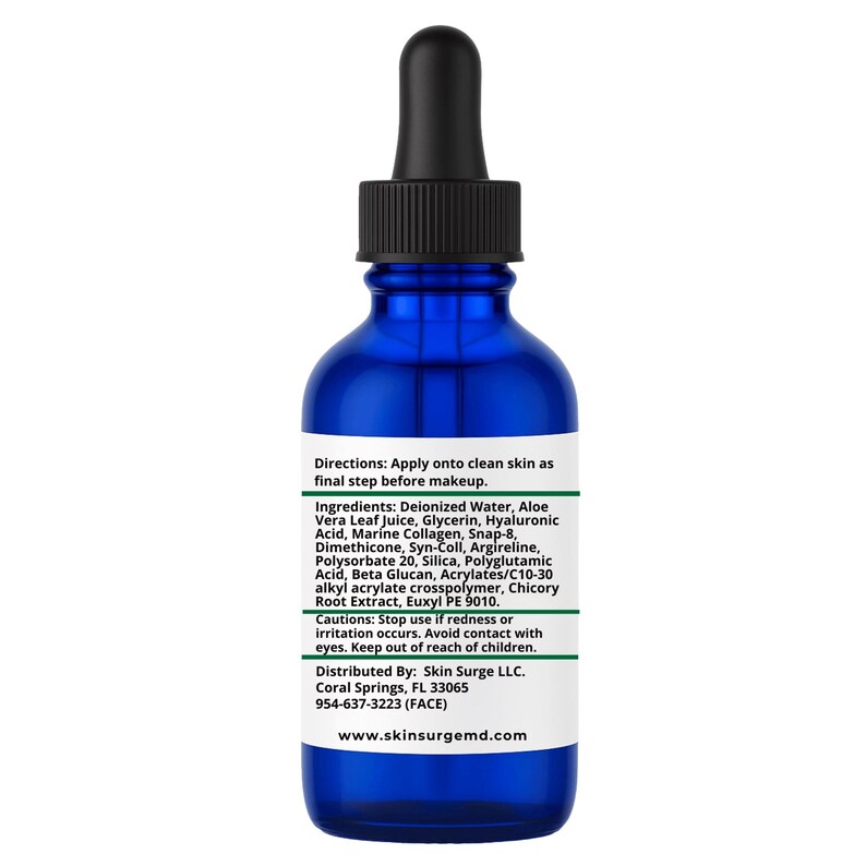 May include: A cobalt blue glass dropper bottle with a black cap. The white label features black text listing directions, ingredients including Deionized Water, Aloe Vera Leaf Juice, Glycerin, Hyaluronic Acid, Marine Collagen, and contact information.