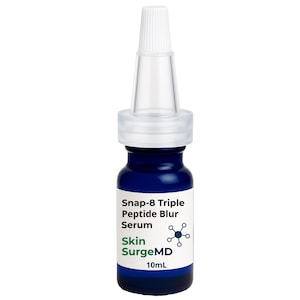 May include: A small blue glass bottle of Snap-8 Triple Peptide Blur Serum by Skin SurgeMD. The bottle features a white label with black and green text, a clear plastic applicator tip, and a volume capacity of 10mL printed on the front label.