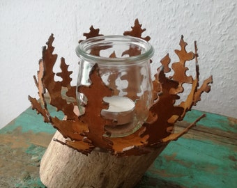 Firewood tealight holder made of metal (naturally rusted), on wood