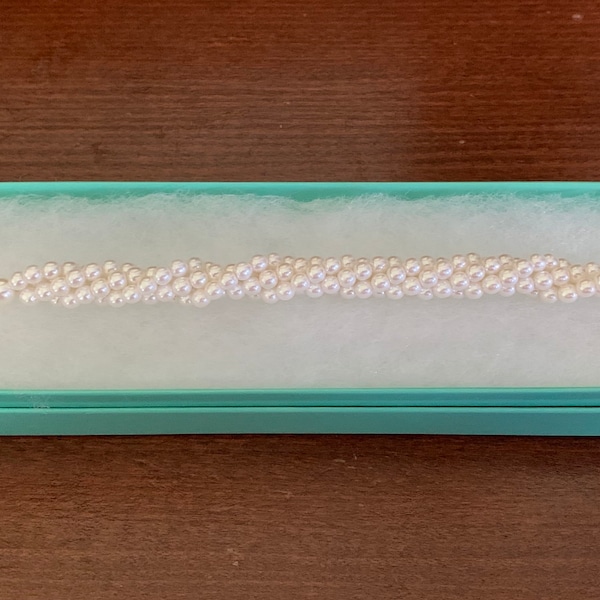 Napier White Seed Pearl Bead Twisted Bracelet. 7 1/4 Inches Long. Napier Jewelry.