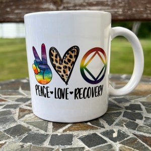 Peace love recovery ceramic mug, available with your choice Alcoholics Anonymous AA or Narcotics Anonymous NA, 11oz or 15 oz