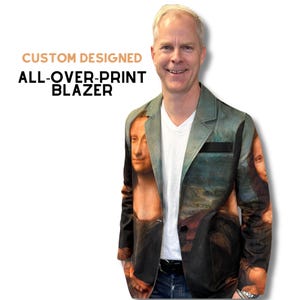 May include: A custom-designed, all-over-print blazer featuring the Mona Lisa painting. The blazer has a black lapel and a green-gray outer layer. The text "CUSTOM DESIGNED ALL-OVER-PRINT BLAZER" is in the upper left corner.