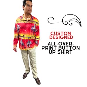 May include: A red button-up shirt with an all-over print of a desert scene with camels. The shirt has long sleeves and a collared neckline. The text "CUSTOM DESIGNED ALL-OVER-PRINT BUTTON UP SHIRT" is displayed on the image.