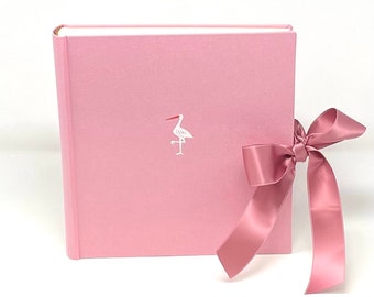 Babyfotoalbum, roze stoffen omslag, 30 x 30 cm, witte ooievaar