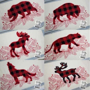 May include: Six different animal silhouettes in a red and black buffalo plaid pattern. The animals are a bear, buffalo, moose, panther, wolf, and reindeer. Each animal is on a white background with a red and black floral design.