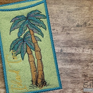 May include: A green and blue embroidered patch with two palm trees and the text "Aloha I'm Home".