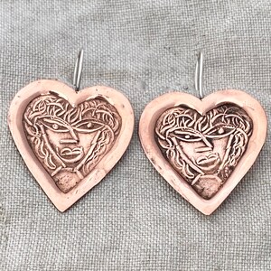 Heart with Venus portrait embossed, super light weight,  copper and sterling silver wire earrings by Cindy Bolin