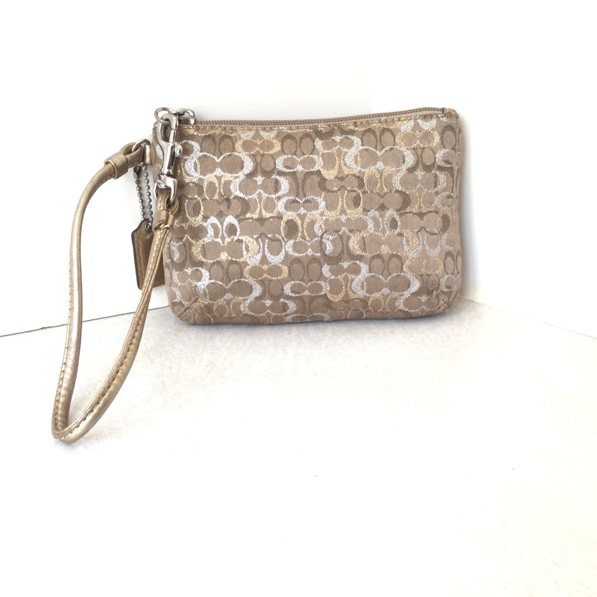 Coach gold wristlet sale