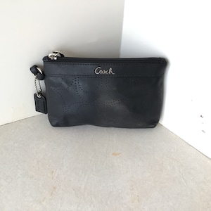 Coach Signature Leather Wristlet With Perforated C In Black