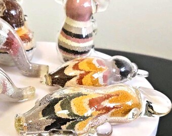 Recuerdos artísticos de mini canguros, koalas y ornitorrincos con diseño de arcoíris