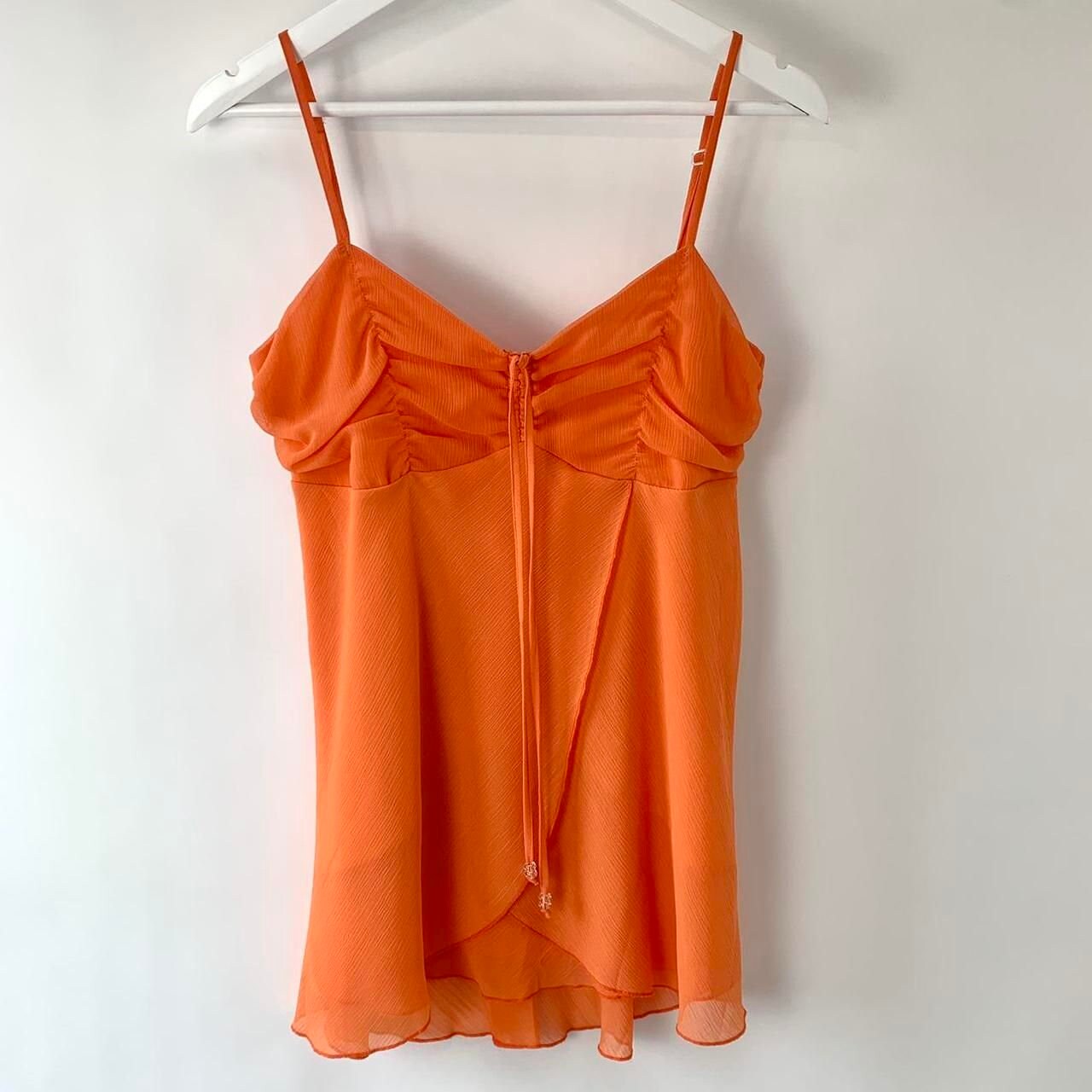 Un haut cami fluide orange taille UK 10 00