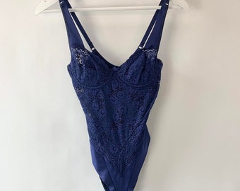 A size UK 8, 00's blue floral lace bodysuit