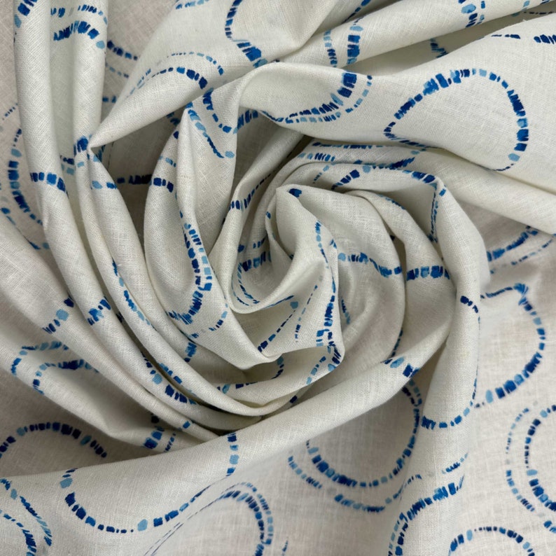 Hikari Circles Linen Cotton Fabric by Art Gallery in a twist.