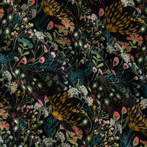 May include: A black fabric with a detailed floral pattern. The design features various flowers and foliage in shades of pink, orange, yellow, green, and white. The overall effect is a dense, botanical print.