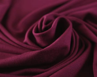 Flowy Bamboo Jersey Fabric in Merlot | Midweight, opaque knit fabric with fluid drape, subtle sheen, and 4 way stretch
