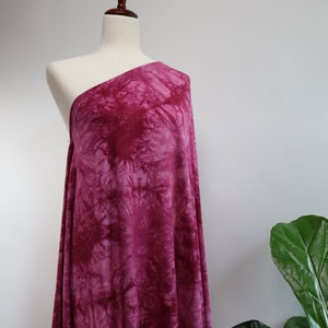 Flowy Bamboo Tie Dye Jersey Fabric in Bordeaux | Midweight, opaque knit fabric with fluid drape, subtle sheen, and 4 way stretch
