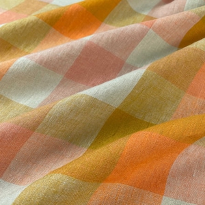 Island Life Laundered Linen Check Fabric in Bright Orange, Coral, Yellow and Cream