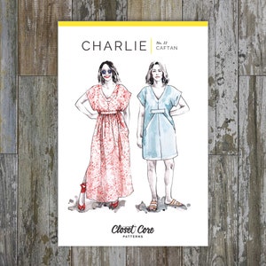 May include: A sewing pattern for a caftan called "Charlie" from Closet Core Patterns. The pattern shows two women wearing different versions of the caftan, one in a red and white print and the other in a light blue.