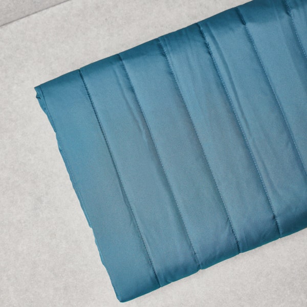 Tissu matelassé thermique Mind the Maker bleu orage | Tissu d'extérieur d'hiver, imperméable et double face pour doudounes et manteaux