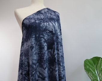 Flowy Bamboo Tie Dye Jersey Fabric in Navy | Midweight, opaque knit fabric with fluid drape, subtle sheen, and 4 way stretch