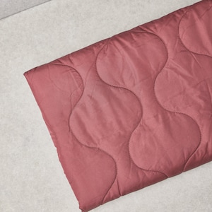 Thermal Quilted Fabric in Rosewood Waves by Mind the Maker