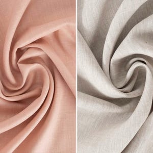 May include: Two swatches of fabric, one in a soft pink labeled "Bunny" and the other in a neutral beige labeled "Oat." The fabrics are artfully draped, showcasing their texture and color variations. Ideal for textiles.