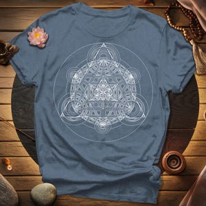 a t - shirt with a picture of a triangle on it