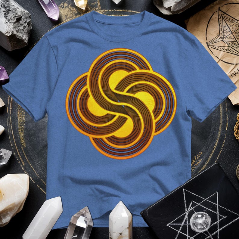 a blue t - shirt with an orange swirl on it