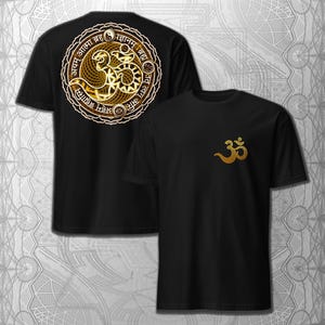 May include: Black t-shirts featuring gold Om symbols. One shirt has a small Om symbol on the chest. The other displays a large, detailed Om symbol on the back, encircled by text and a circular design. The shirts are shown against a patterned backdrop.