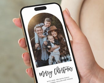 May include: A digital Christmas card with a photo of a family of four. The card has a white background with a black archway and the text "merry Christmas" in black cursive. The text "WITH LOVE, THE SMITH FAMILY JOHN, AMANDA, WILLIAM AND THOMAS" is also in black text.