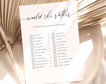 May include: A printable "Would She Rather" bridal shower game with a list of 10 questions for guests to guess the bride's preference. The game is printed on white paper with black text.