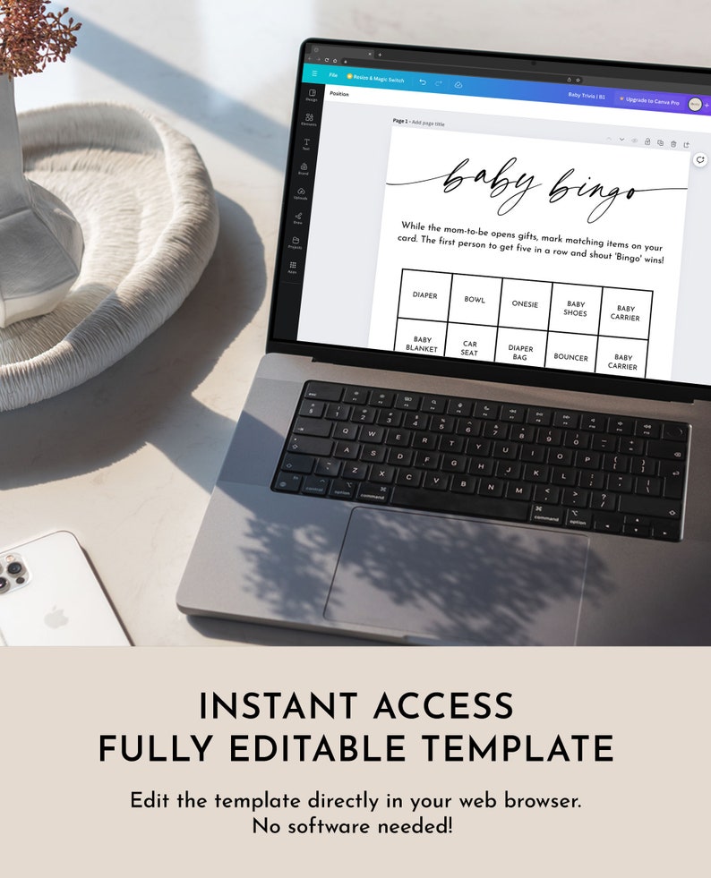 May include: A laptop computer displaying a printable baby bingo game card. The card has a white background with black text and includes items like diaper, bowl, onesie, baby shoes, baby carrier, baby blanket, car seat, diaper bag, bouncer, and baby carrier. The text on the card reads "baby bingo" and "While the mom-to-be opens gifts, mark matching items on your card. The first person to get five in a row and shout 'Bingo' wins!"
