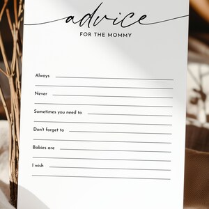 May include: A white card with black text that reads "advice for the mommy". The card has lines for writing advice for a new mom.