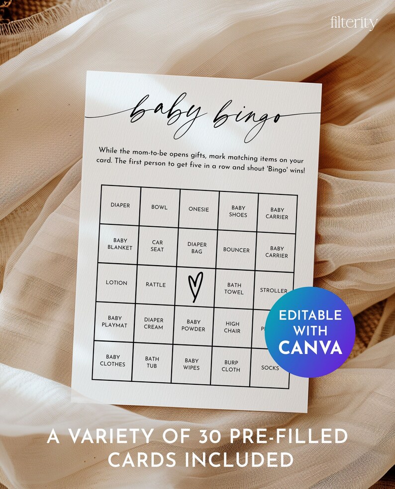 May include: A printable baby bingo card with a variety of 30 pre-filled cards included. The card features a black and white design with a heart in the center. The text "baby bingo" is written in cursive at the top of the card. The text "Editable with Canva" is written in a circle at the bottom right corner of the card.