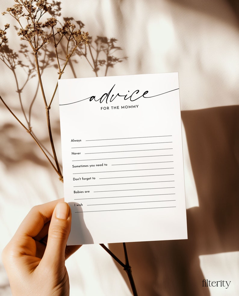 May include: A white card with black text that reads "advice for the mommy". The card has blank lines for writing advice for a new mom.