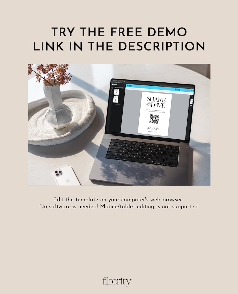 May include: A laptop computer displaying a wedding invitation template with a QR code and the text "SHARE the LOVE". The template is on a white background with black text. The laptop is on a light brown table with a white vase and a white phone.